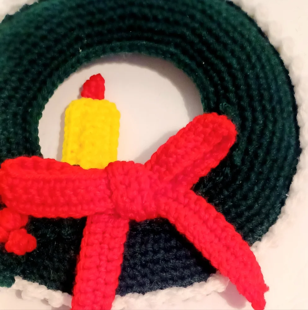 Crocheted Christmas Wreath with Candle, Bow, and Holly Berries